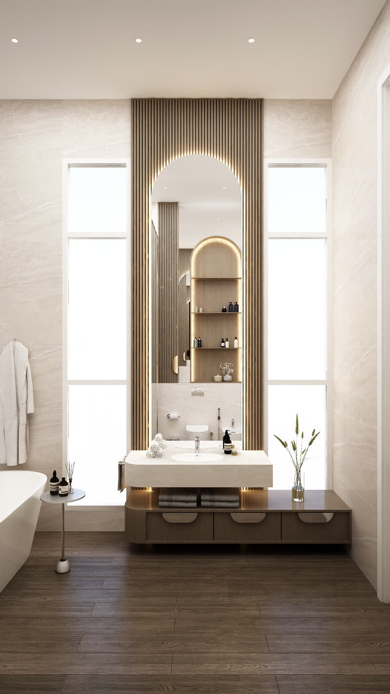 Bathroom with an arched mirror, stone vanity and freestanding tub