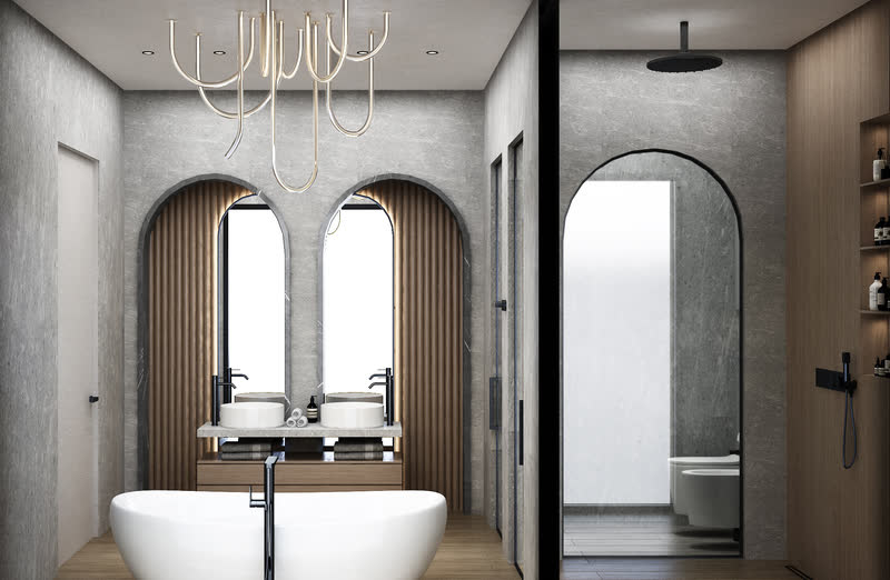 Arched bathroom with a freestanding tub and full-height stone