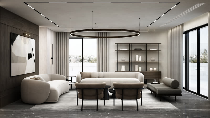 Bright living room with curved seating and a circular pendant