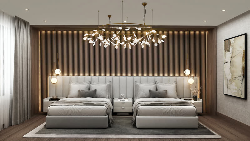 Principal bedroom with a brass chandelier and upholstered headboards